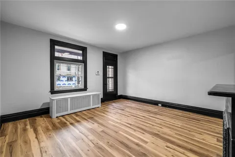 a view of an empty room and window