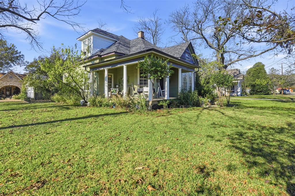 114 S Field Cleburne, TX 76033 - Photo 23 of 23 a front view of a house with garden