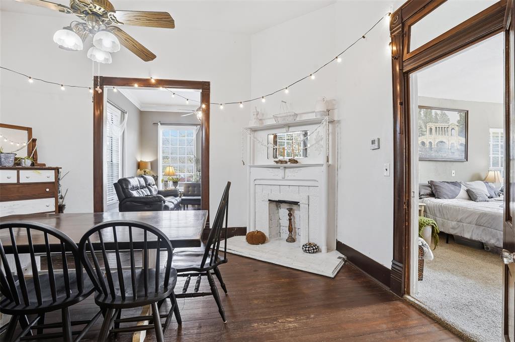 114 S Field Cleburne, TX 76033 - Photo 8 of 23 a view of a dining room with furniture and wooden floor
