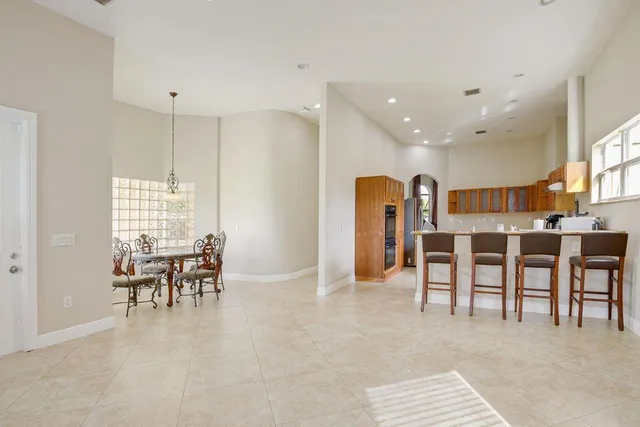 a view of a livingroom with furniture and a table