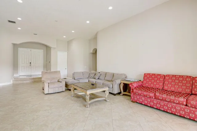 a living room with furniture and a couch