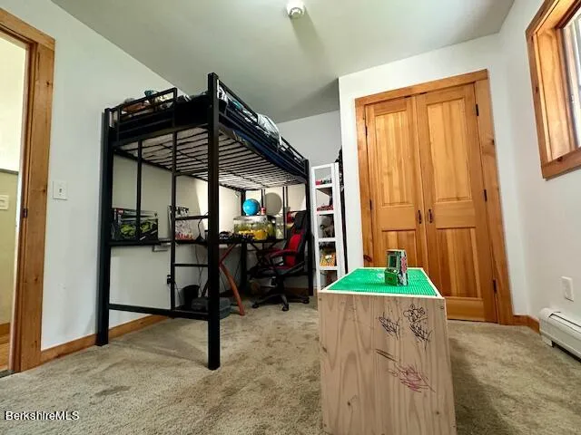 a view of a two chairs in the garden