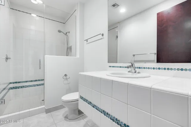 a utility room with closet dryer and washer