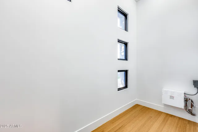 a view of backyard with outdoor seating and green space