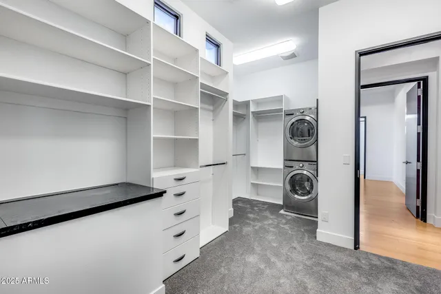 a view of a backyard with swimming pool