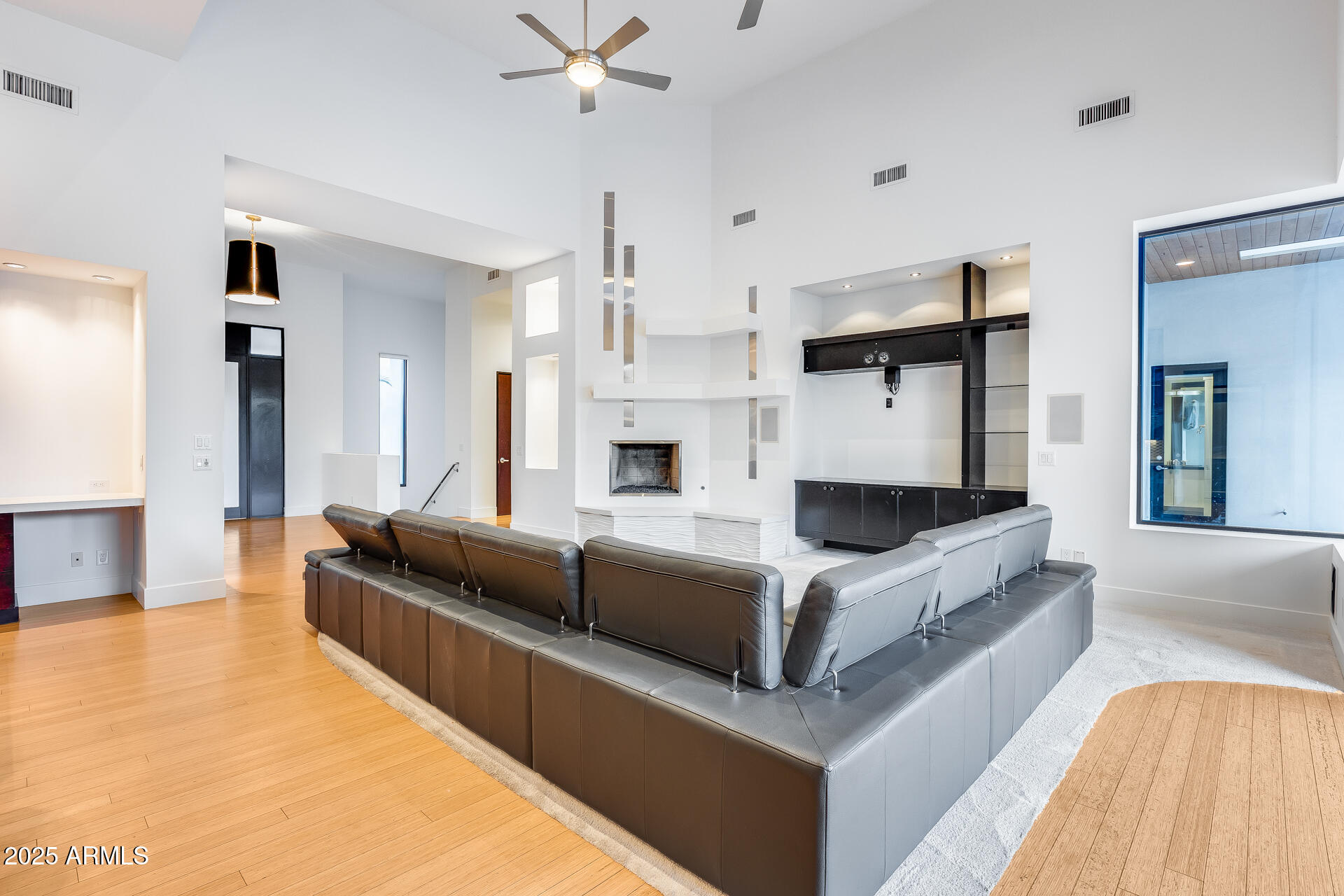 1101 East Warner Road, Unit 117 Tempe, AZ 85284 - Photo 40 of 69 a living room with furniture and a chandelier