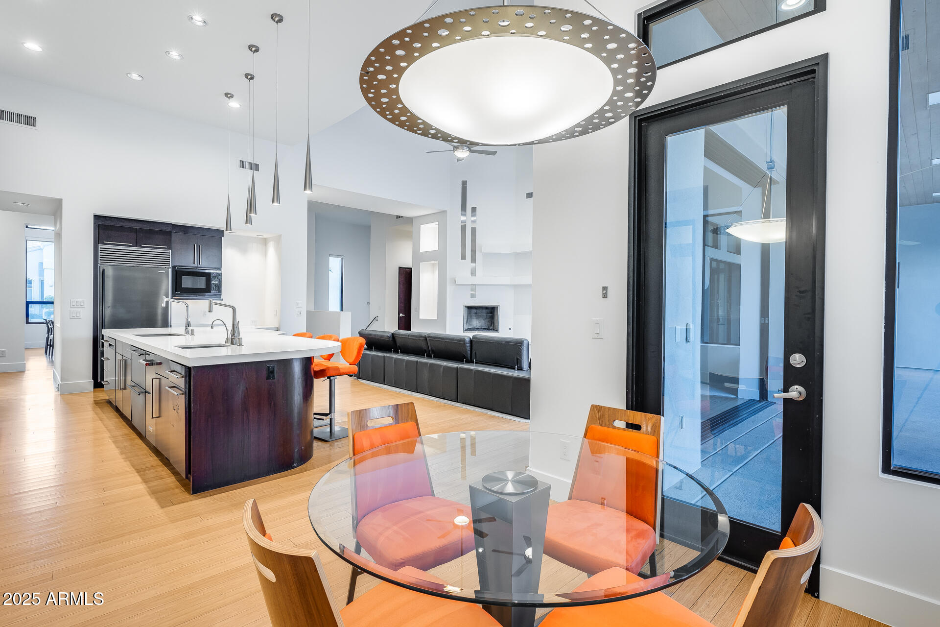 1101 East Warner Road, Unit 117 Tempe, AZ 85284 - Photo 43 of 69 a living room with stainless steel appliances kitchen island granite countertop a stove a sink a dining table and chairs