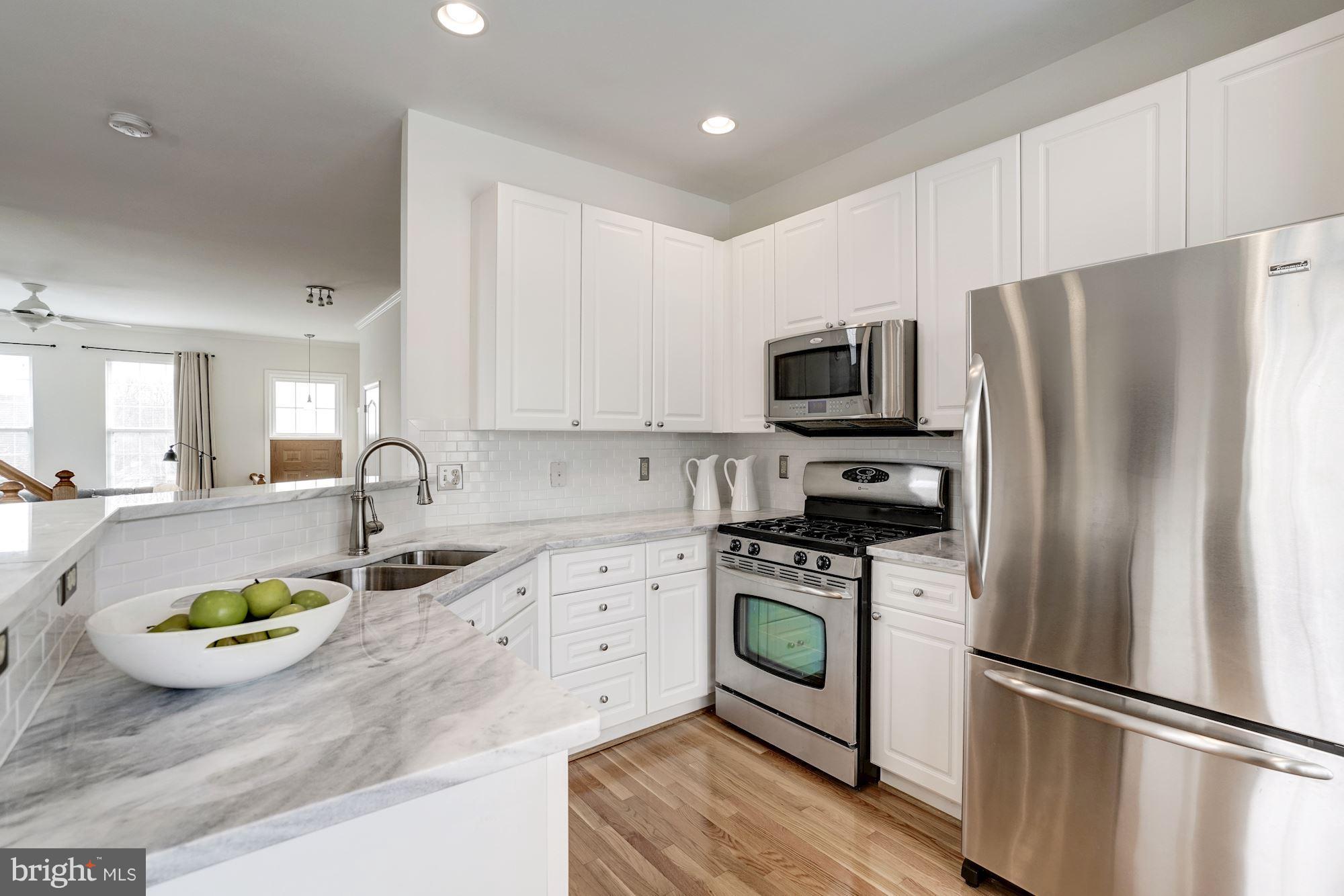 12007 Edgemere Circle Reston, VA 20190 - Photo 6 of 19 New Granite, appliances and tile backsplash