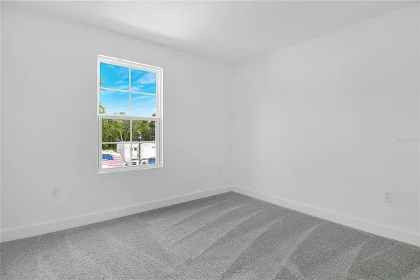 an empty room with a window