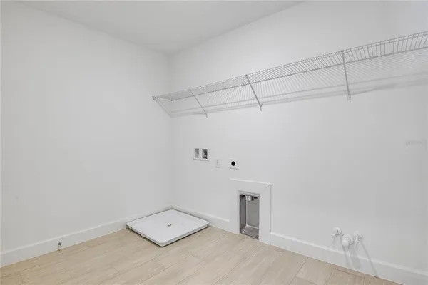 a view of a room with an empty walk in closet