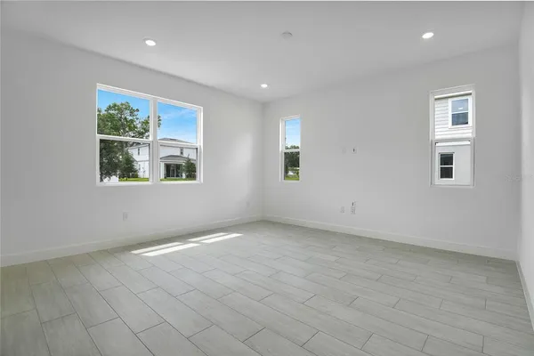 an empty room with windows