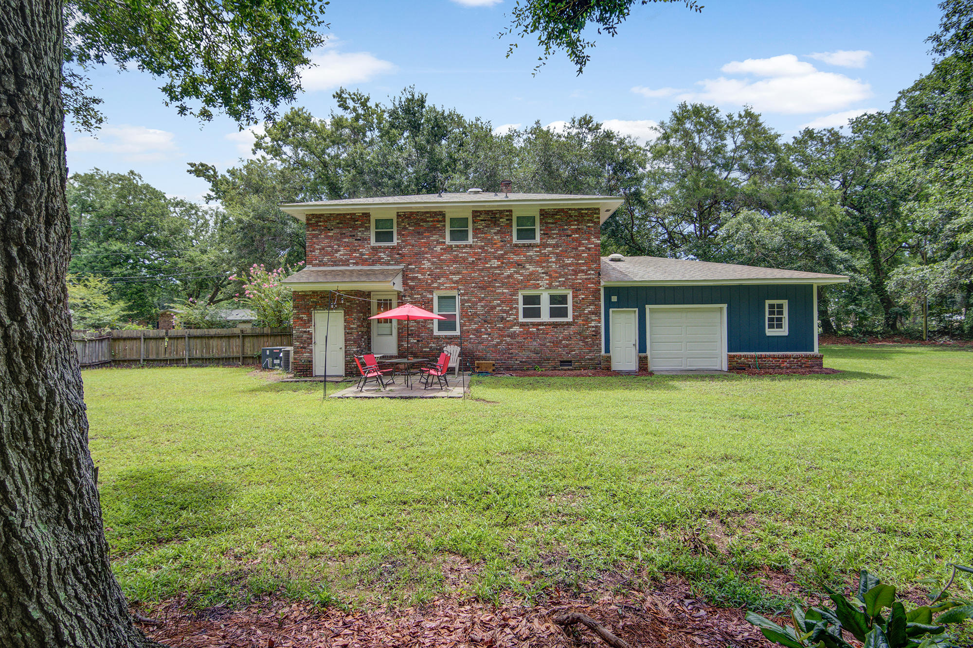 842 Fort Johnson Road Charleston, SC 29412 - Photo 28 of 32 Rear Patio and backside garage door