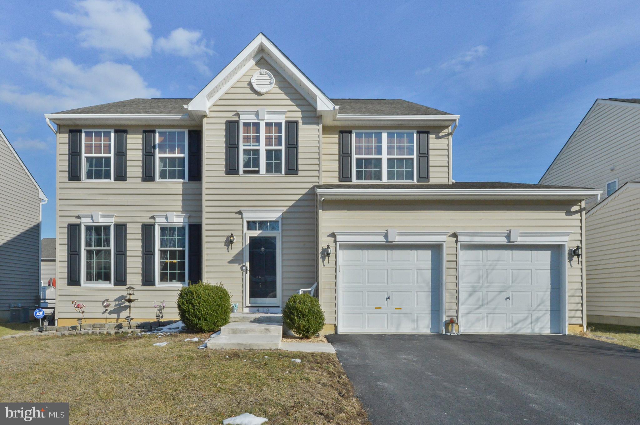 418 Bergenia Loop Bear, DE 19701 - Photo 1 of 27 a view of a brick house with many windows