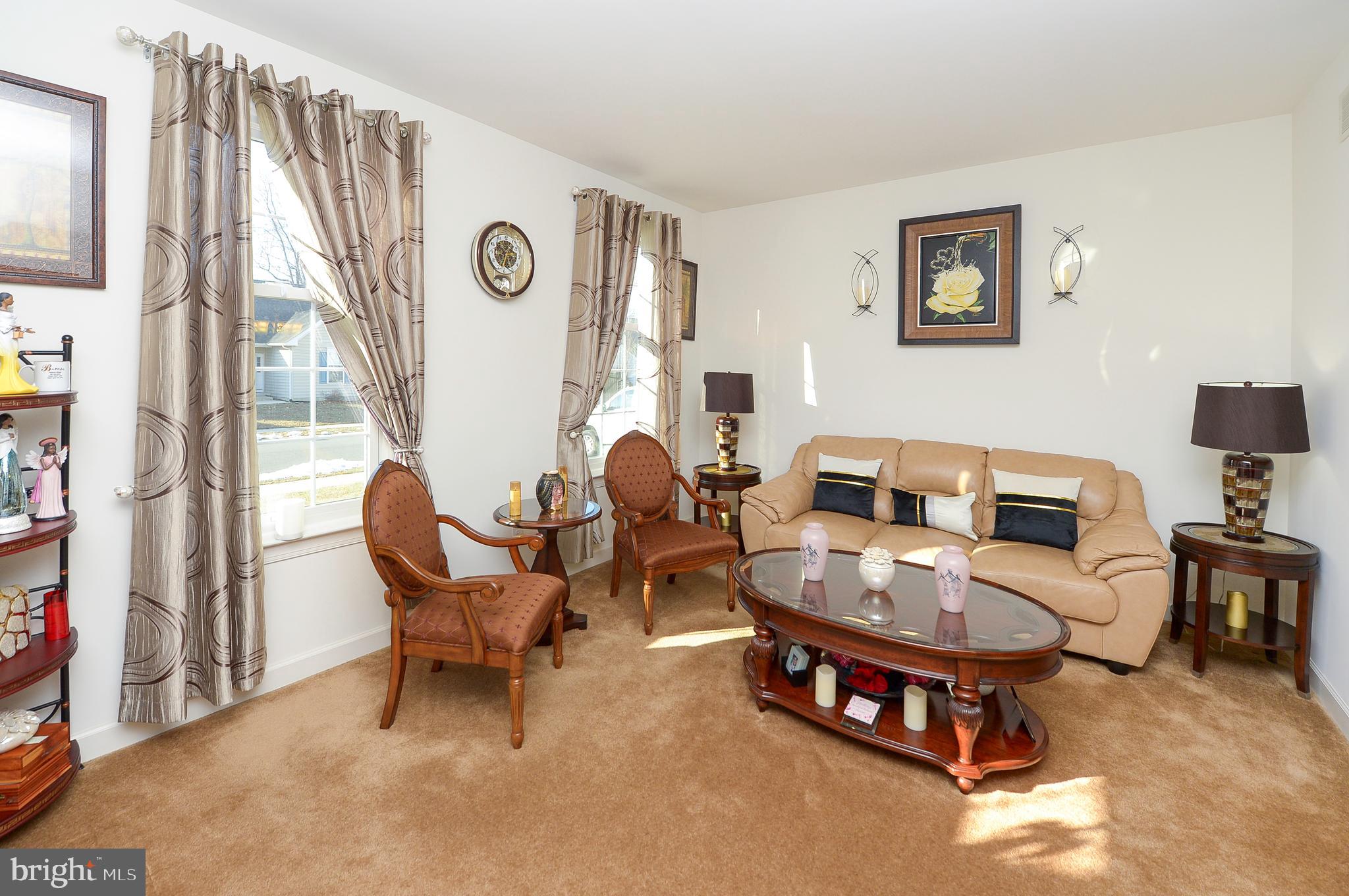 418 Bergenia Loop Bear, DE 19701 - Photo 3 of 27 a living room with furniture and a window