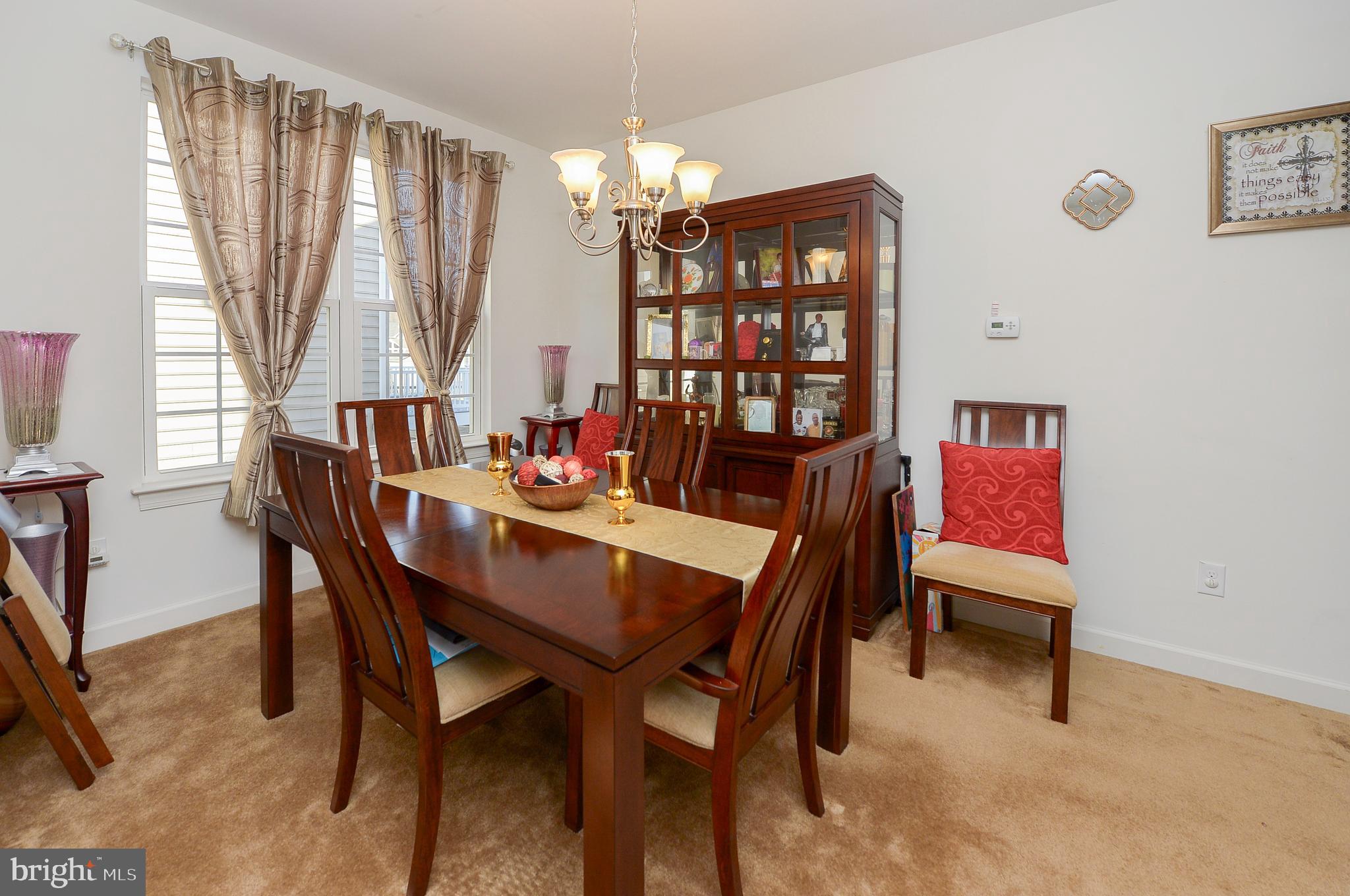 418 Bergenia Loop Bear, DE 19701 - Photo 4 of 27 a dining room with furniture and window