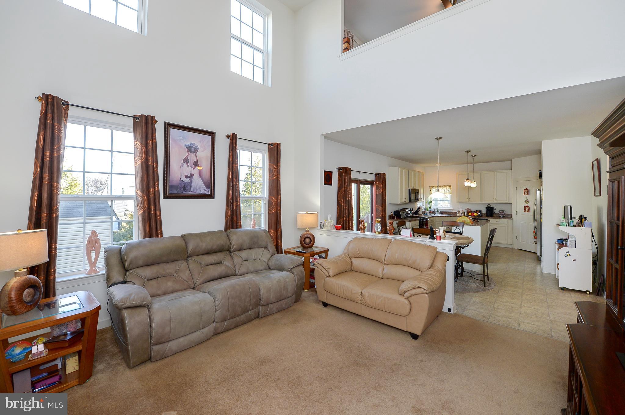 418 Bergenia Loop Bear, DE 19701 - Photo 7 of 27 a living room with furniture and a large window