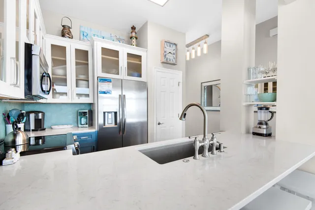 a bedroom with bed and a large cabinets