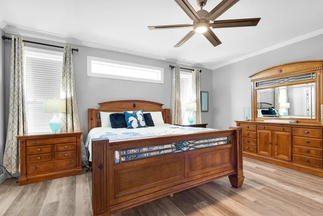 a bedroom with a bed and a dresser