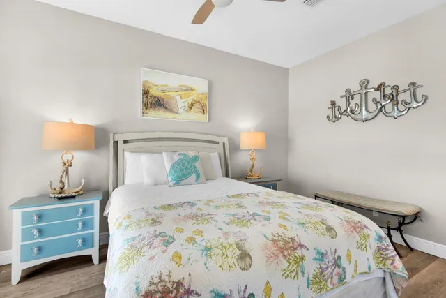 a bedroom with a bed and a tv