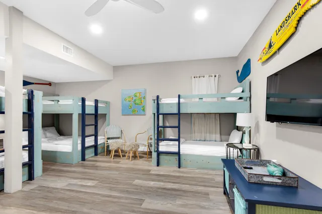 a view of a livingroom with furniture and an empty room