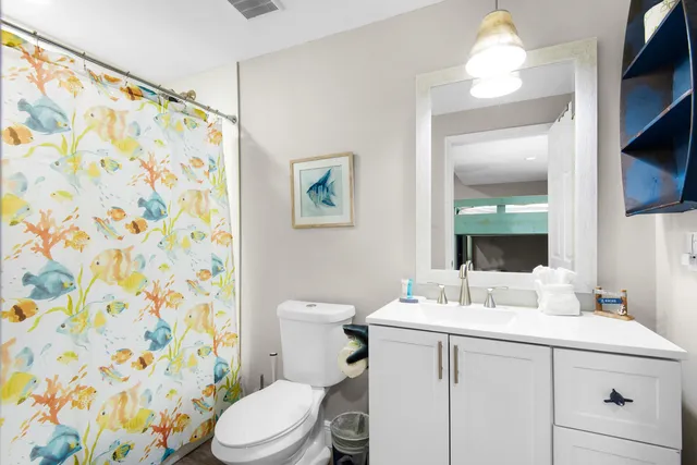 a view of a building with a yard and sitting space