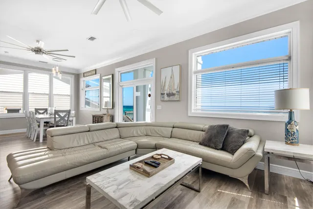 a living room with furniture and a window