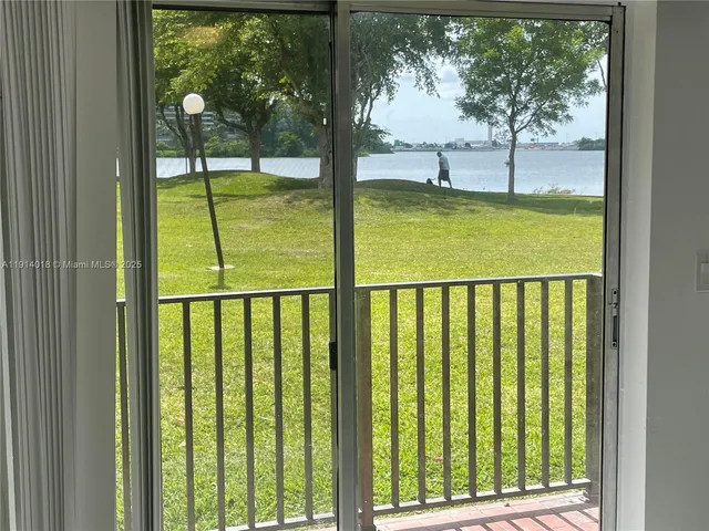a view of a lake with beach