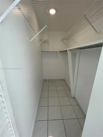 a view of a utility room with empty racks