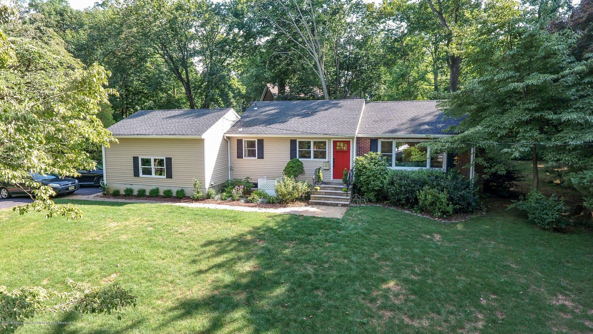 76 Bruce Road Red Bank, NJ 07701 - Photo 2 of 24 a house that has a lot of plants in it