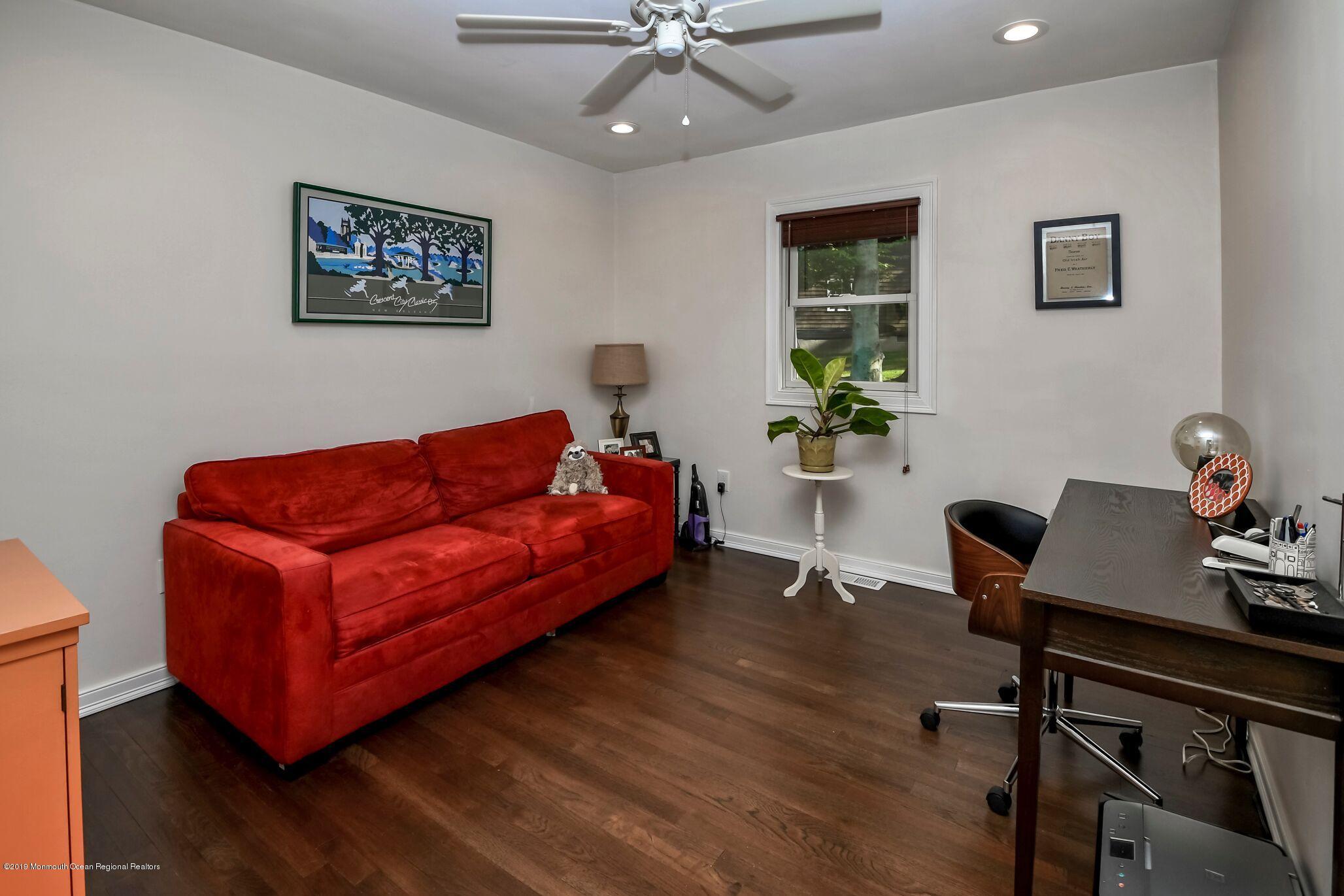 76 Bruce Road Red Bank, NJ 07701 - Photo 16 of 24 a living room with furniture and a window