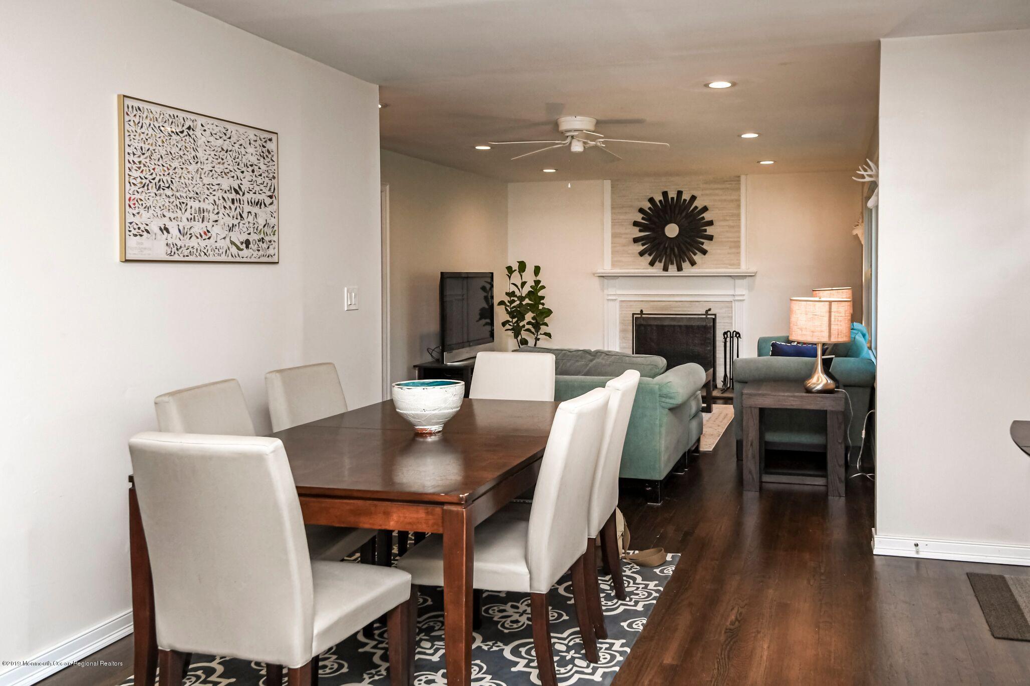 76 Bruce Road Red Bank, NJ 07701 - Photo 8 of 24 a view of a dining room with furniture and wooden floor