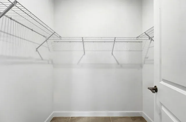 a view of a room with racks on the wall