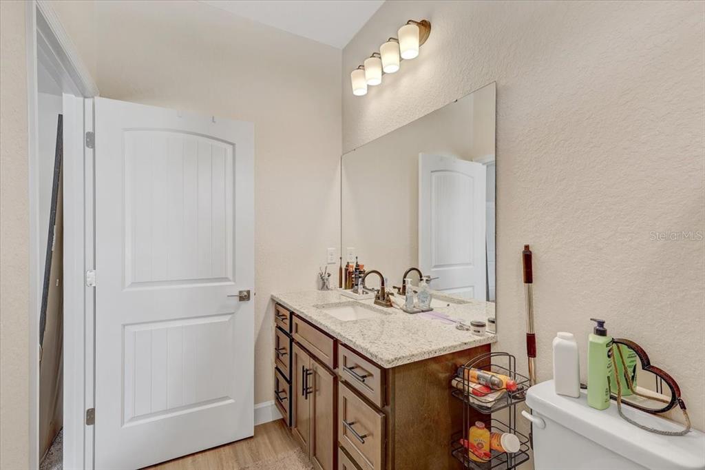 7314 Madrid Road Weeki Wachee, FL 34613 - Photo 21 of 54 a bathroom with a sink and a mirror