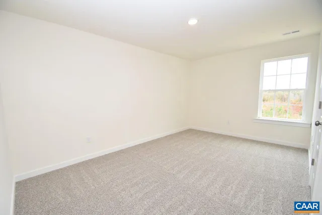 a bathroom with a sink toilet and a mirror