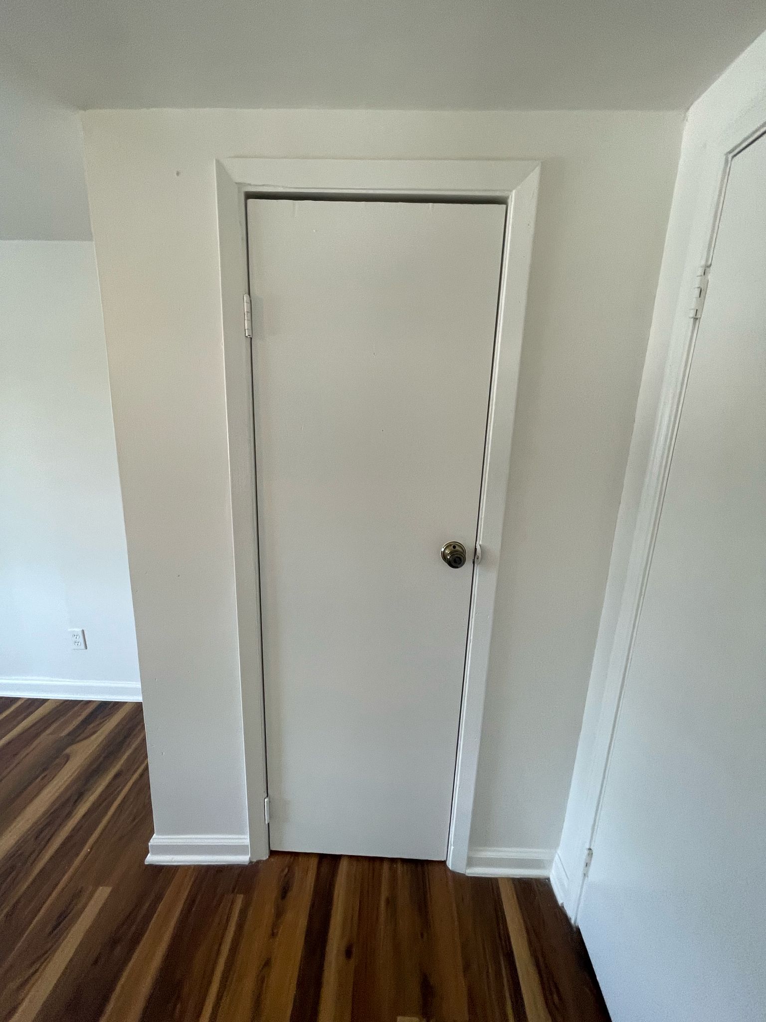 6404 Ponca Street, Unit B Austin, TX 78741 - Photo 10 of 17 a view of closet with wooden floor