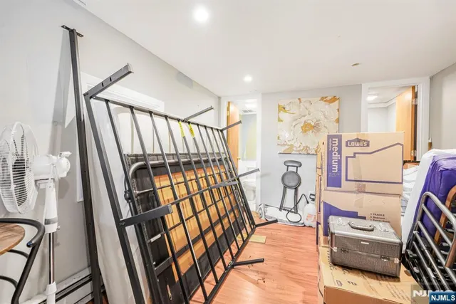 a view of a livingroom with furniture and entryway