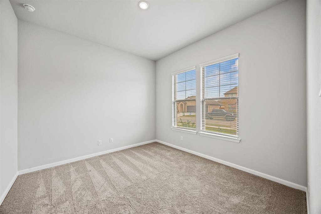 1422 Red Clover Avenue Van Alstyne, TX 75495 - Photo 17 of 30 an empty room with a window