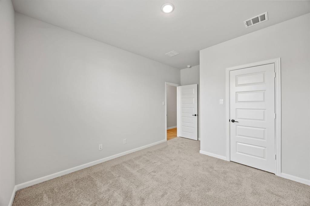 1422 Red Clover Avenue Van Alstyne, TX 75495 - Photo 20 of 30 an empty room with an entryway