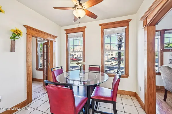 a view of a dining room with furniture window and outside view
