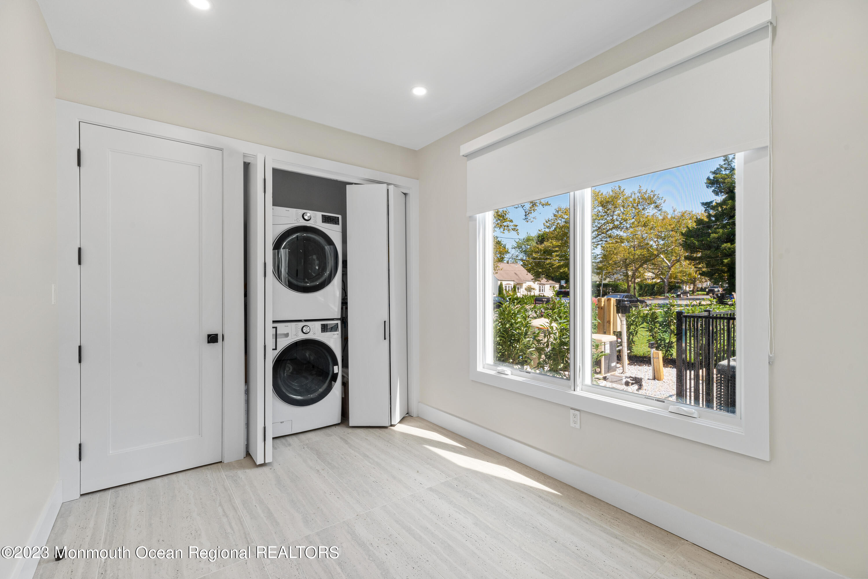 929 Van Ct Avenue Long Branch, NJ 07740 - Photo 14 of 37 a view of a bedroom with washer and dryer
