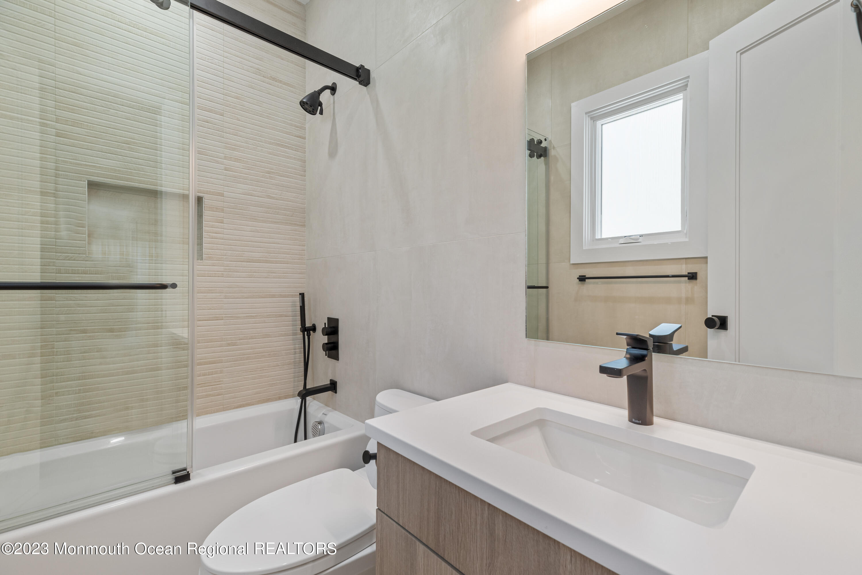 929 Van Ct Avenue Long Branch, NJ 07740 - Photo 15 of 37 a bathroom with a sink toilet and shower