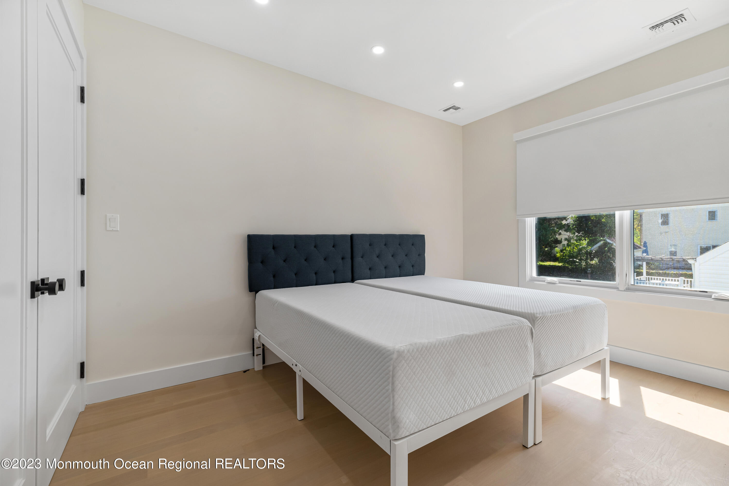 929 Van Ct Avenue Long Branch, NJ 07740 - Photo 17 of 37 a bedroom with a bed and window