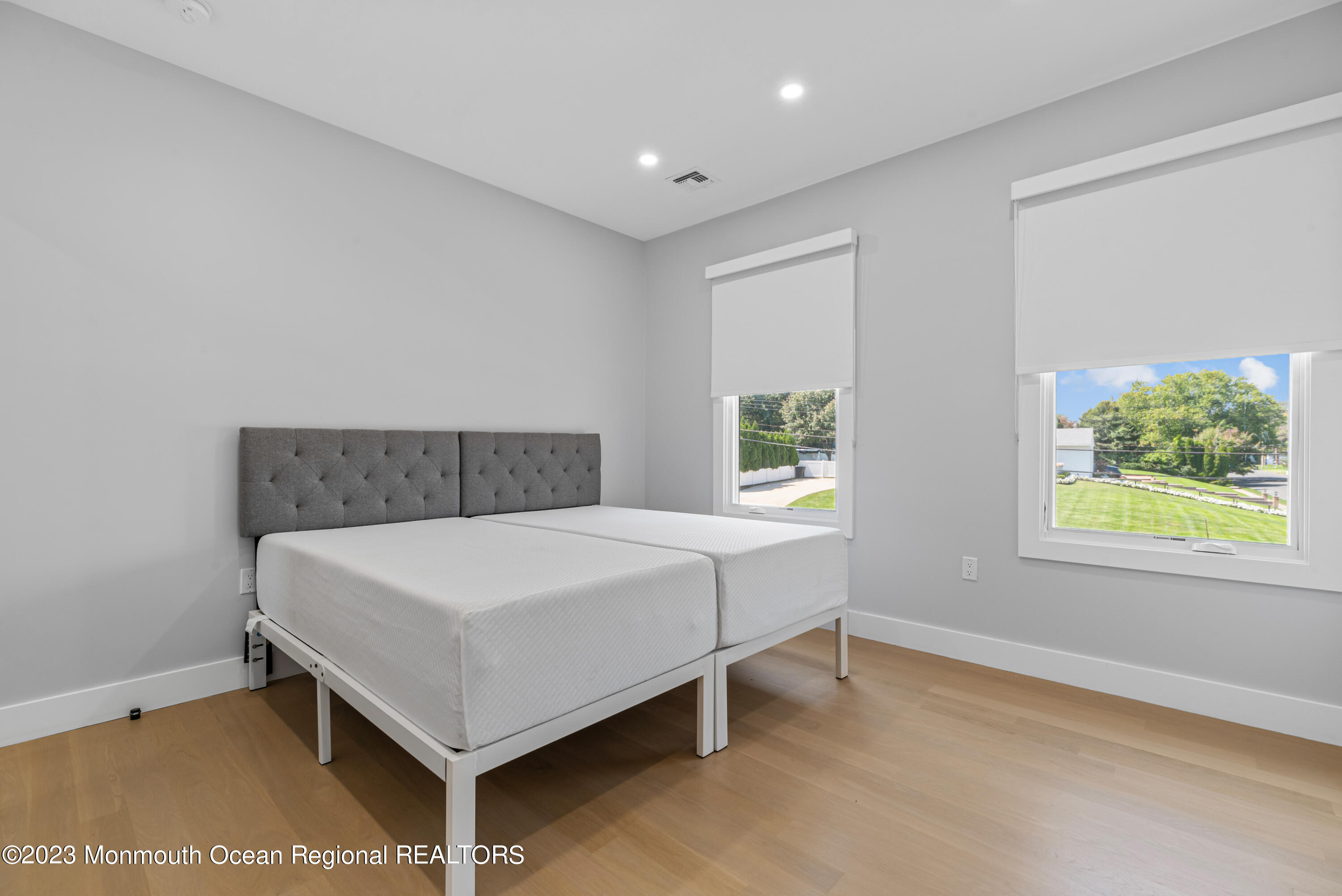 929 Van Ct Avenue Long Branch, NJ 07740 - Photo 23 of 37 a room with a bed and window