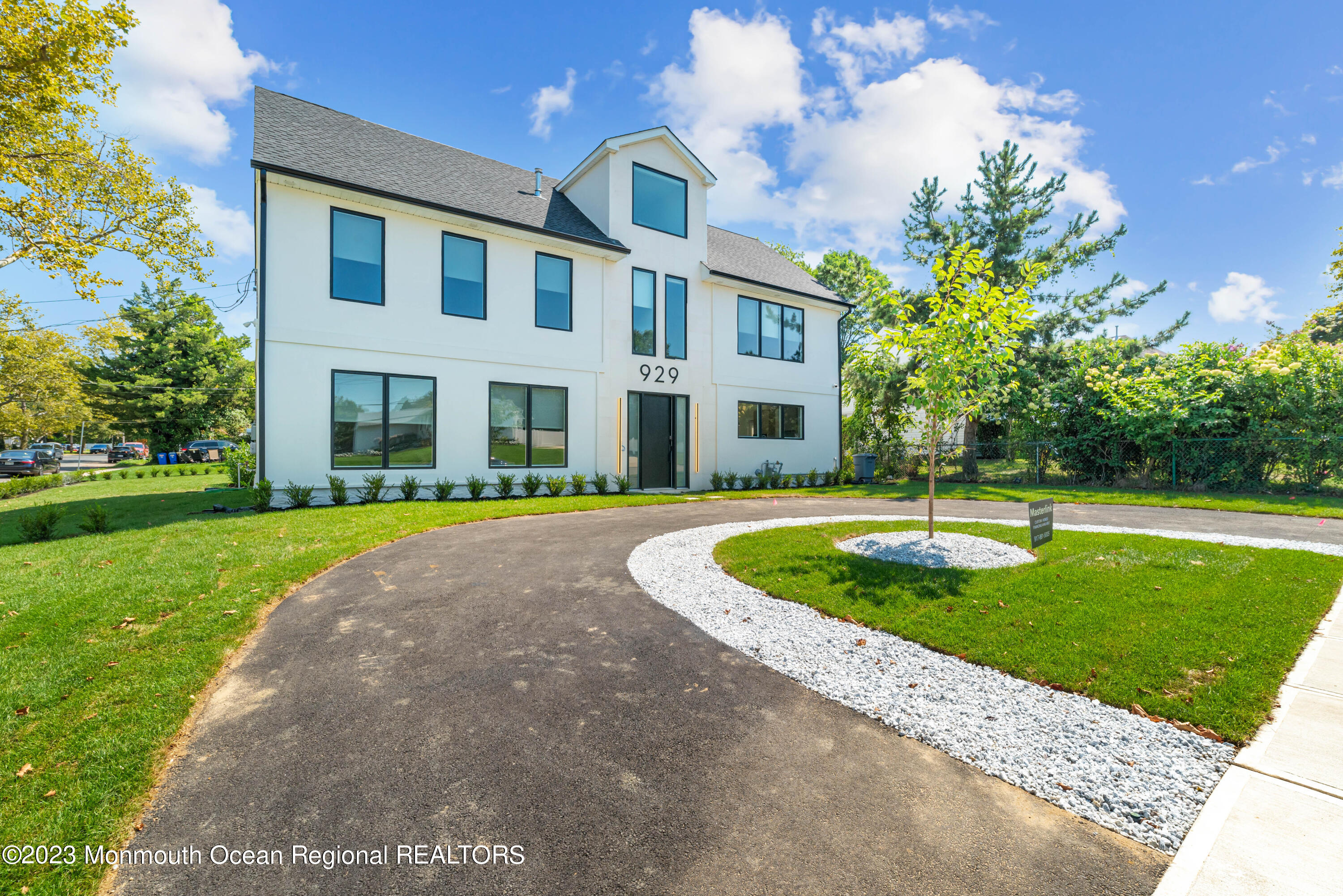 929 Van Ct Avenue Long Branch, NJ 07740 - Photo 36 of 37 a front view of a house with a yard