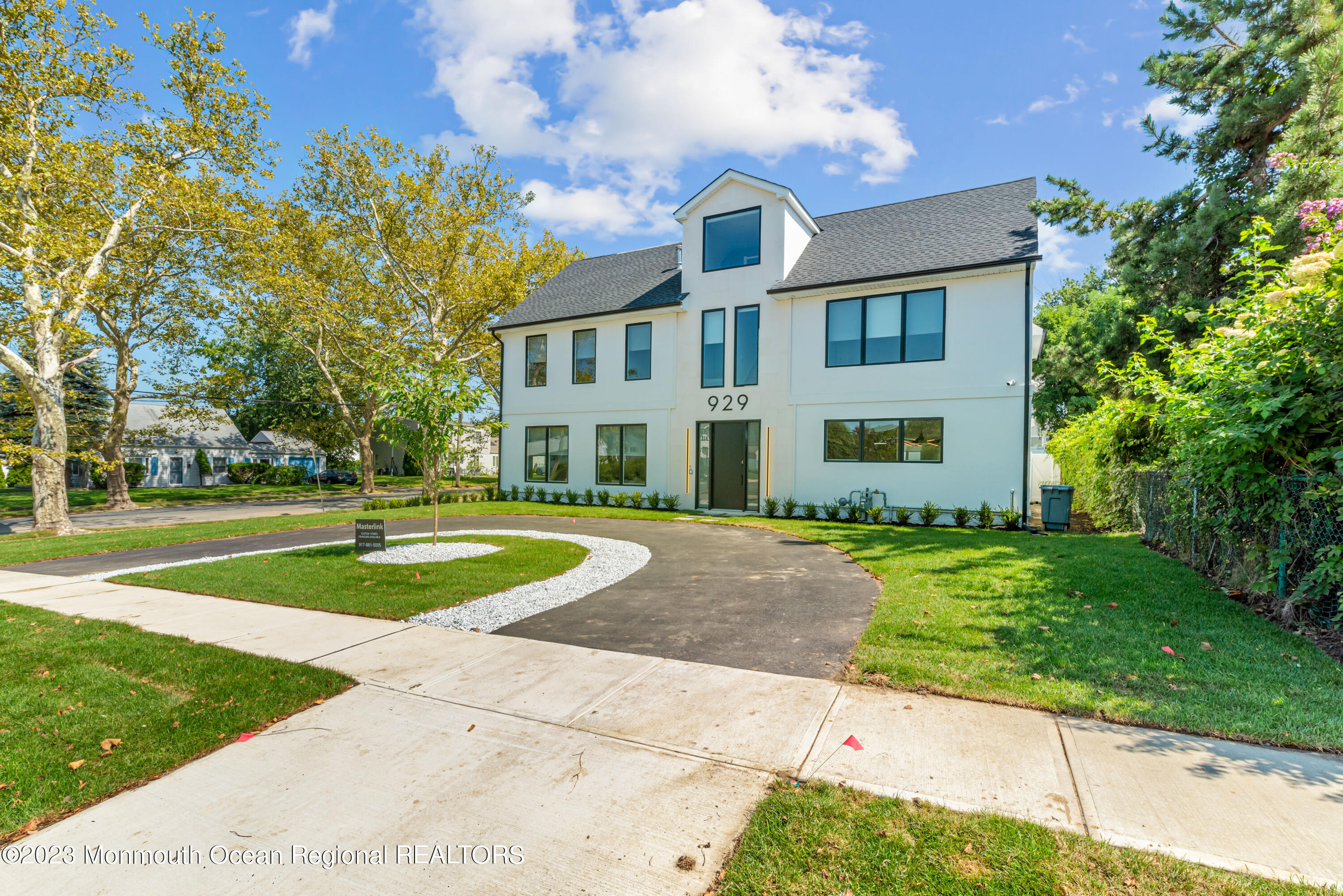 929 Van Ct Avenue Long Branch, NJ 07740 - Photo 37 of 37 a front view of a house with a yard