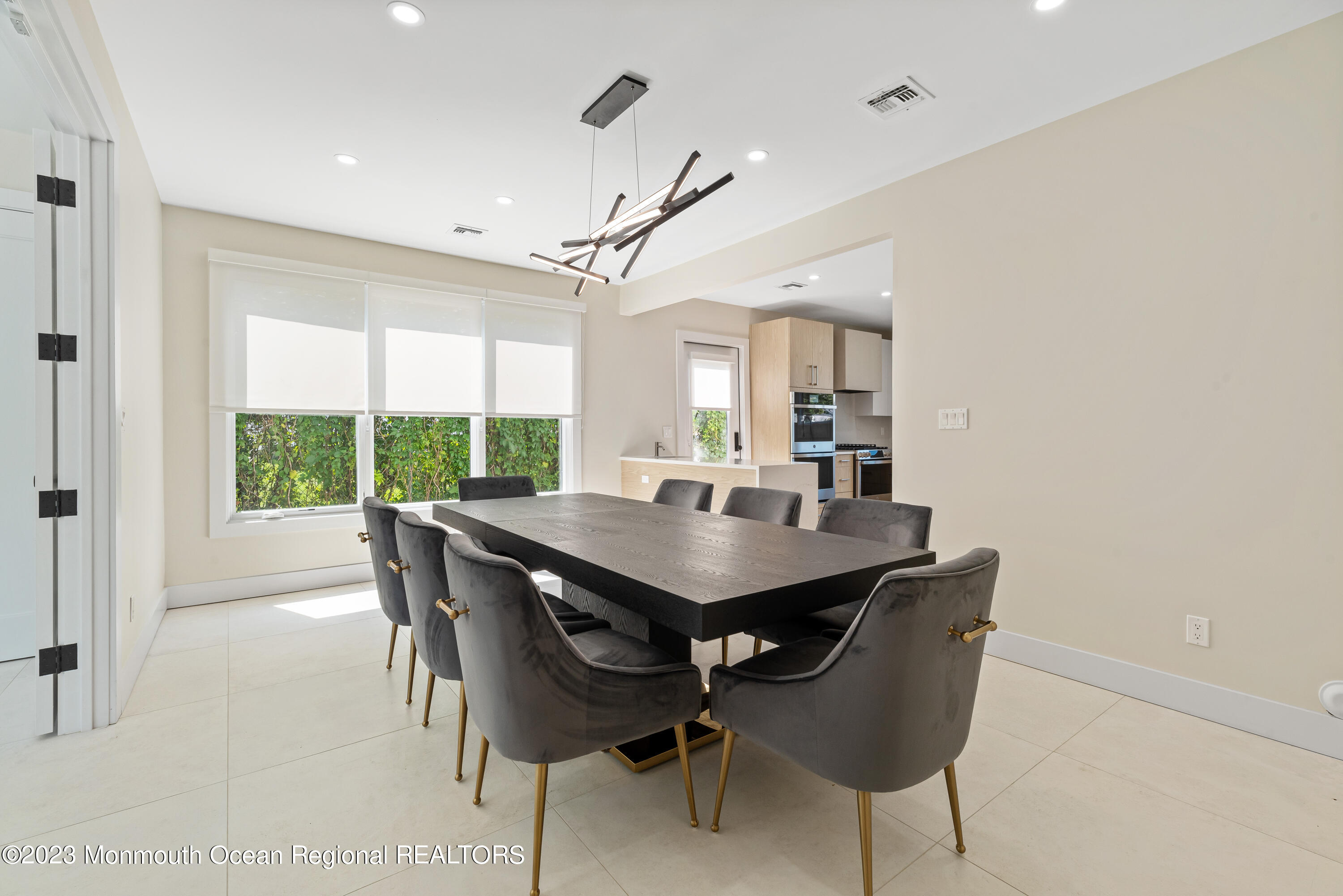 929 Van Ct Avenue Long Branch, NJ 07740 - Photo 10 of 37 a view of a dining room with furniture window and wooden floor