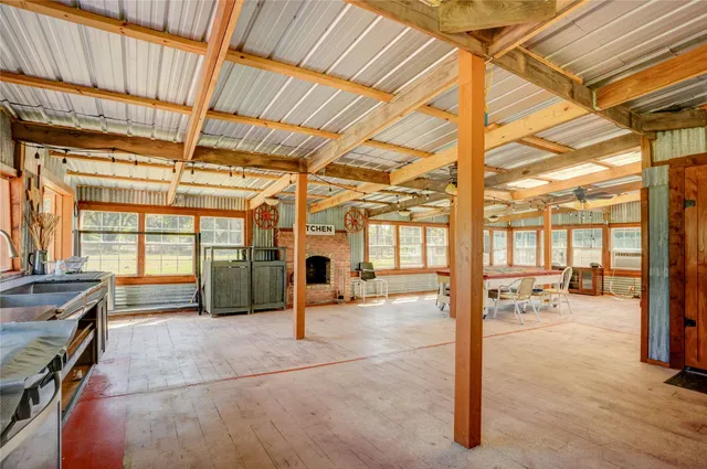 a living room with furniture and a table
