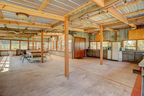 a view of a room with racks on the wall