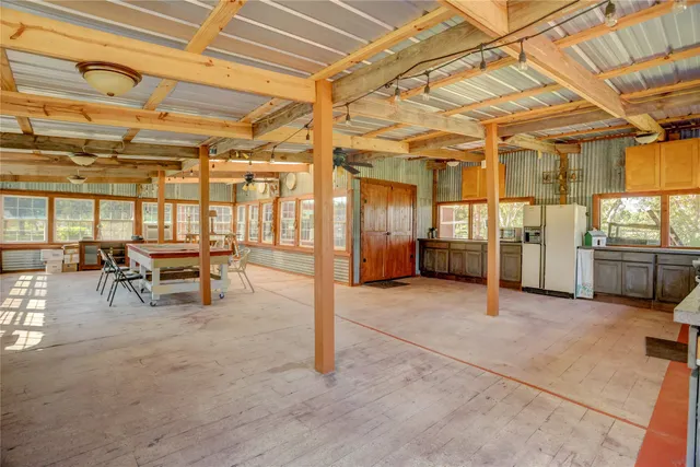 a view of a room with racks on the wall