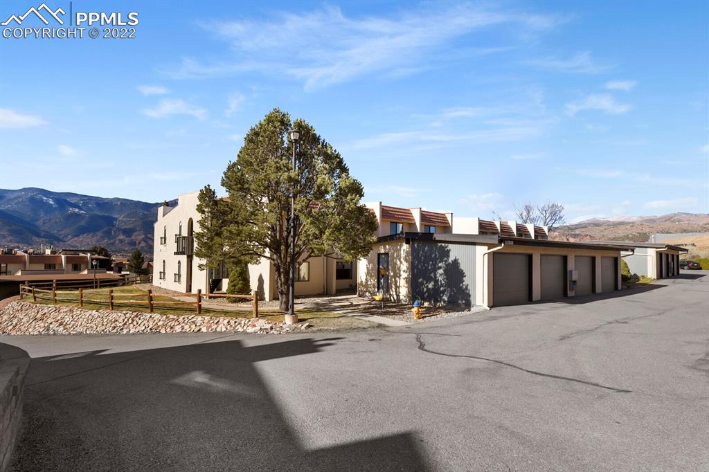 1130 Fontmore Road, Unit C Colorado Springs, CO 80904 - Photo 2 of 27 a view of a building with a road